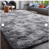 9' x 12'. Rectangle Antonije Machine Made Shag Polyester Area Rug in Grey